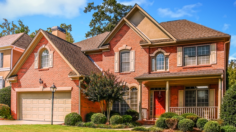 Brick house and red door