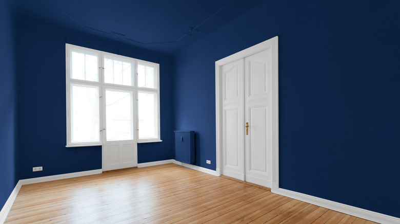room with blue ceilings and walls