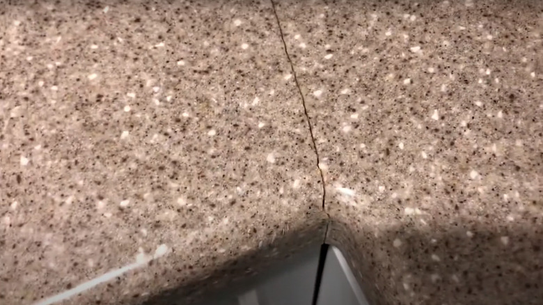 Cracked Corian countertop