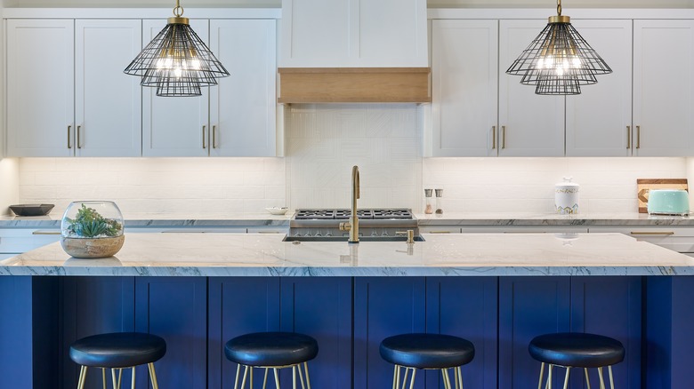 Matching countertops with blue island
