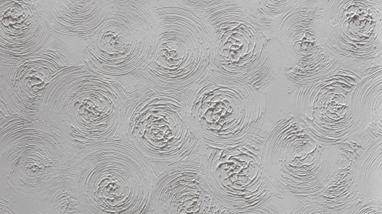 Deliberate swirl pattern on a white ceiling