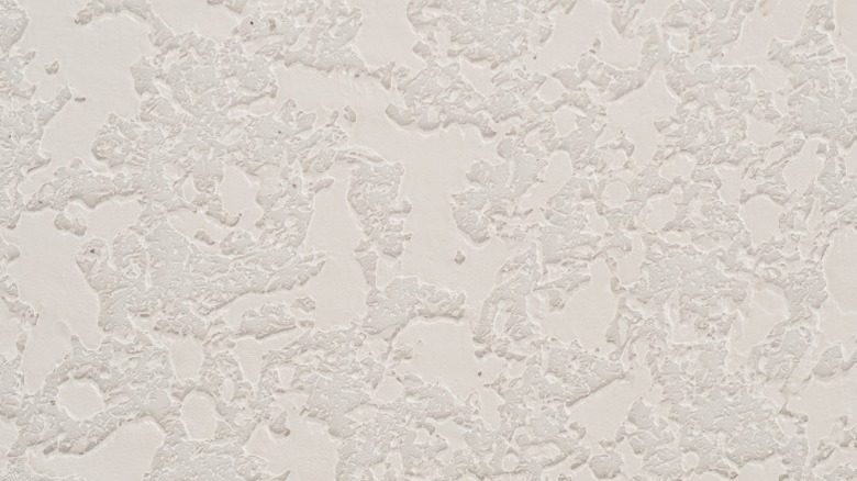 A closeup of a knockdown texture ceiling