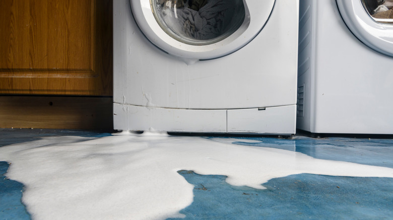Soap and water flooding out of washing machine