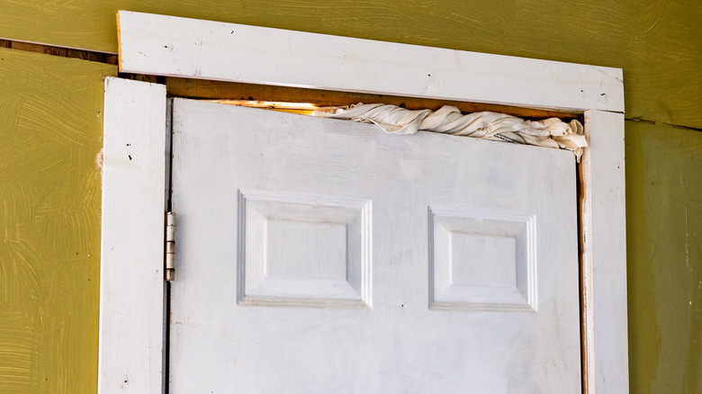 Crooked door and broken frame