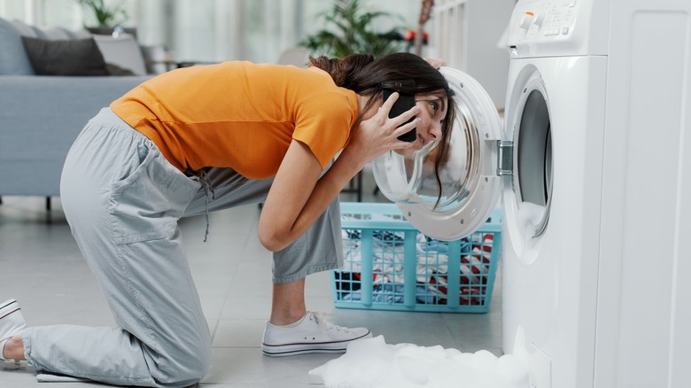 professional connecting washing machine drainage