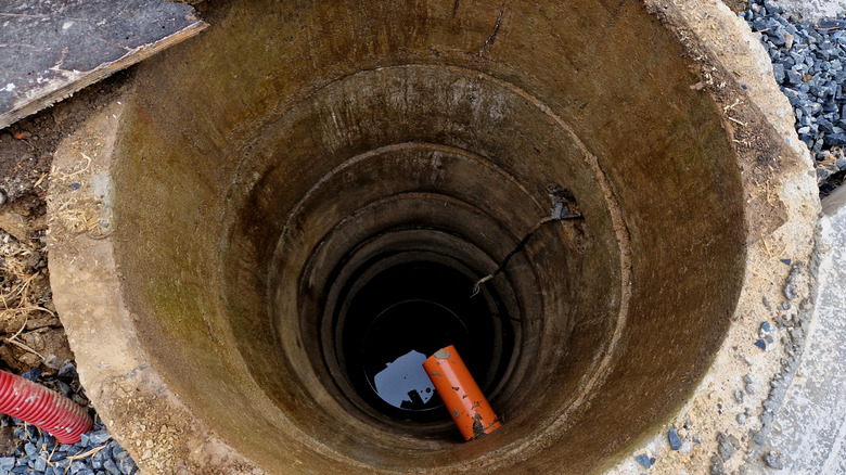 Dry well with small amount of water at the bottom