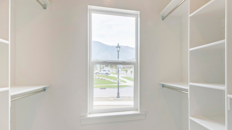 Lamppost seen through single-hung window 
