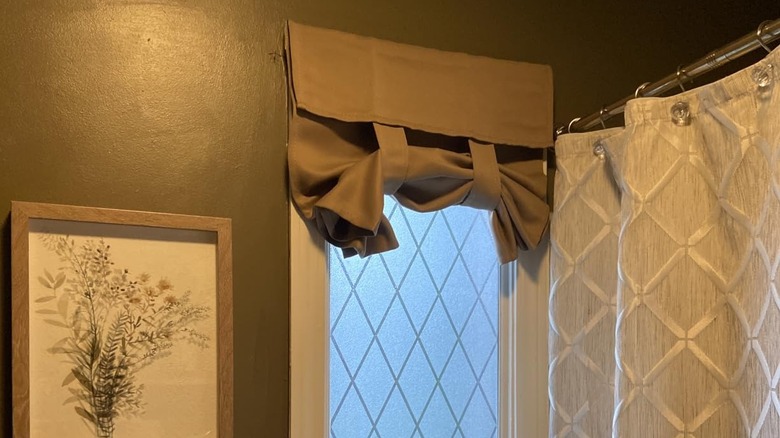 Dark tan curtains on a window