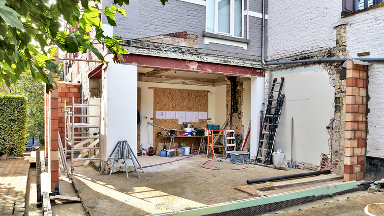 A backyard patio halfway through the renovation process.