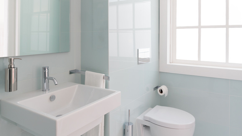 Small bathroom with natural lighting coming through window