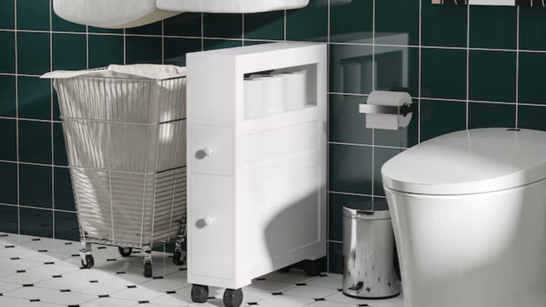 Slim bathroom cabinet on casters in a bathroom setting