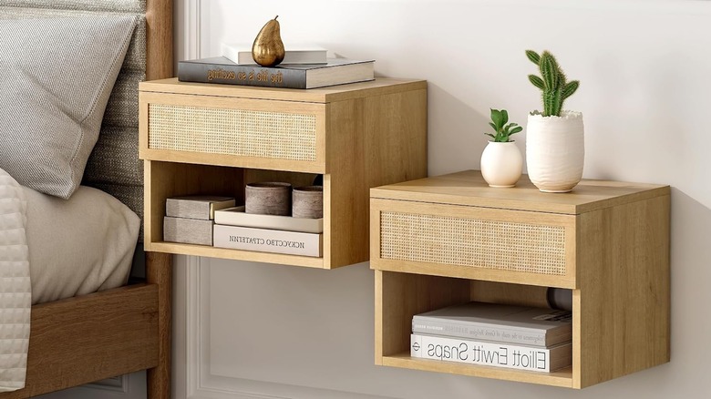 Two floating rattan bedside tables.