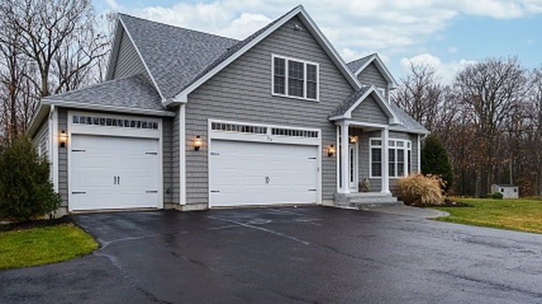 A home with a driveway made from compacted asphalt millings