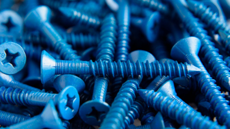 A pile of blue concrete screws