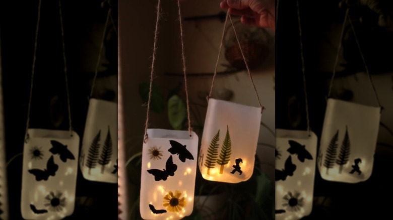 Backyard lanterns made from milk jugs and string lights
