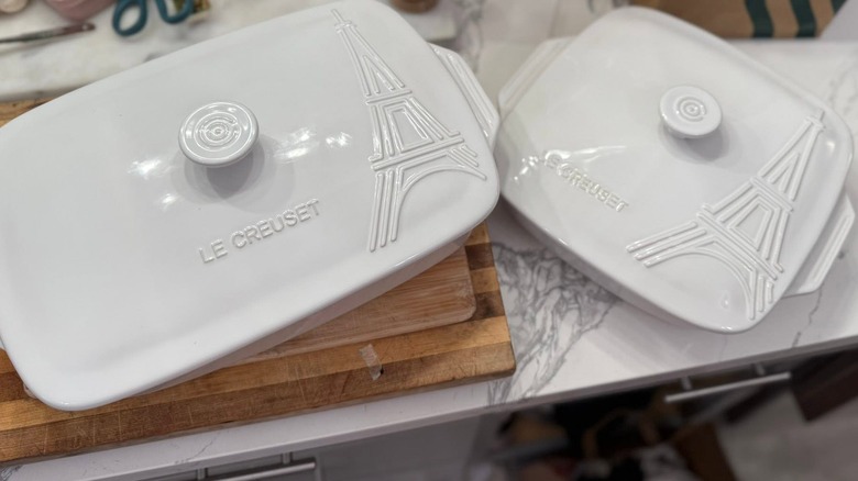 Topdown view of two Le Crueset dishes from the Eiffel Tower collection on a table