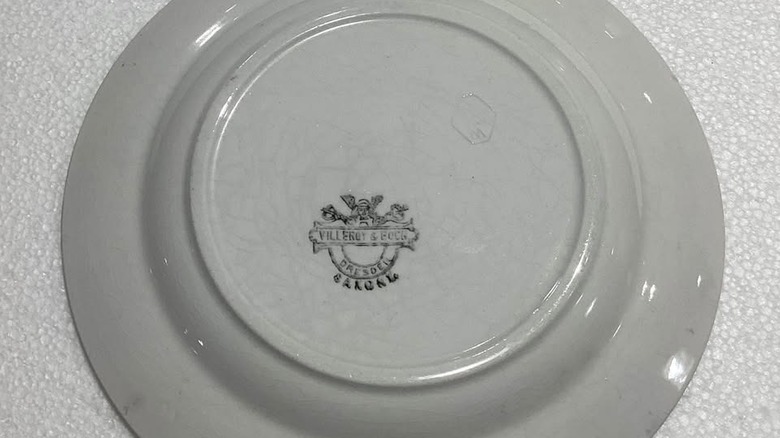 Closeup of the mercury mark on a Villeroy & Boch antique plate, likely circa 1899