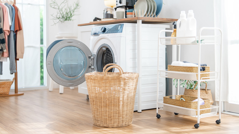 Laundry room with rolling cart