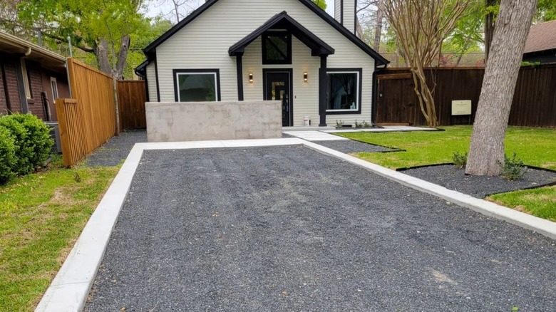 Black star rock installed in a home's driveway