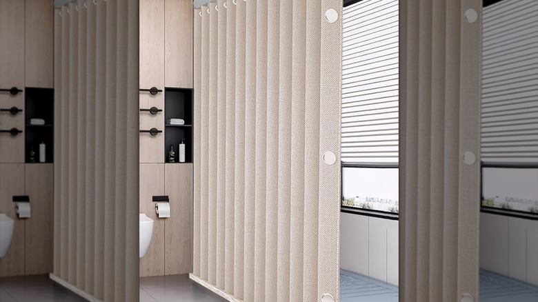 A product image of a waterproof folding shower curtain in a bathroom area with the magnets on full display.