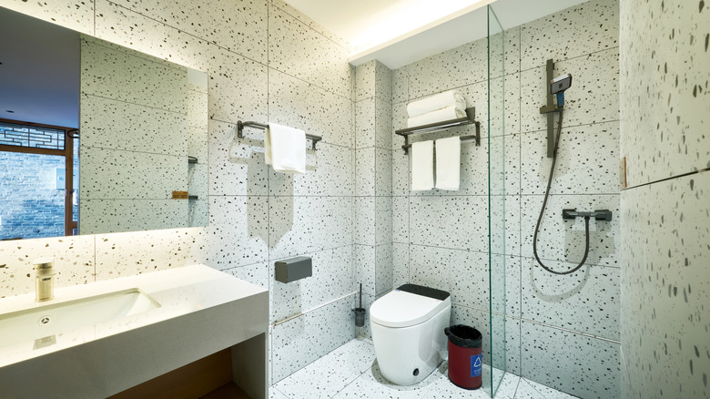 A modern wet room in a small bathroom