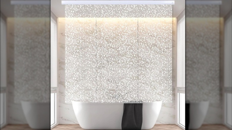 Jakooz ceiling-mounted shower curtain in bathroom