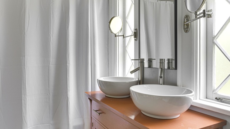 Shower curtain in bathroom