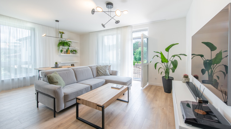 Minimalist living room with fun white overhead lights