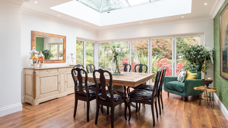 An open dining room with skylights