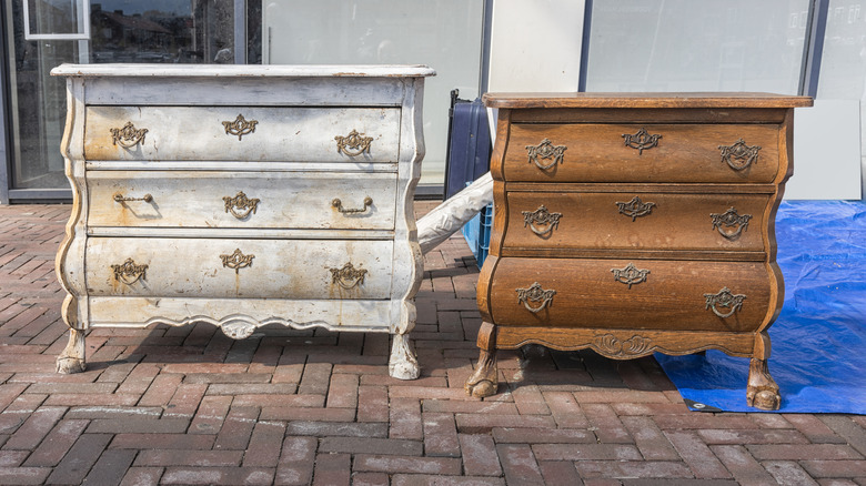 Old chests of drawers on a brick patio