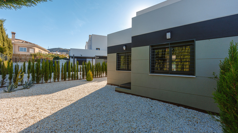 Contemporary house with a gravel driveway
