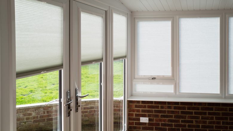 Perfectly sized blinds installed on glass French doors