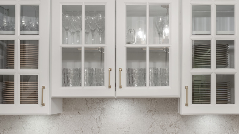 glass-paneled cabinets in kitchen