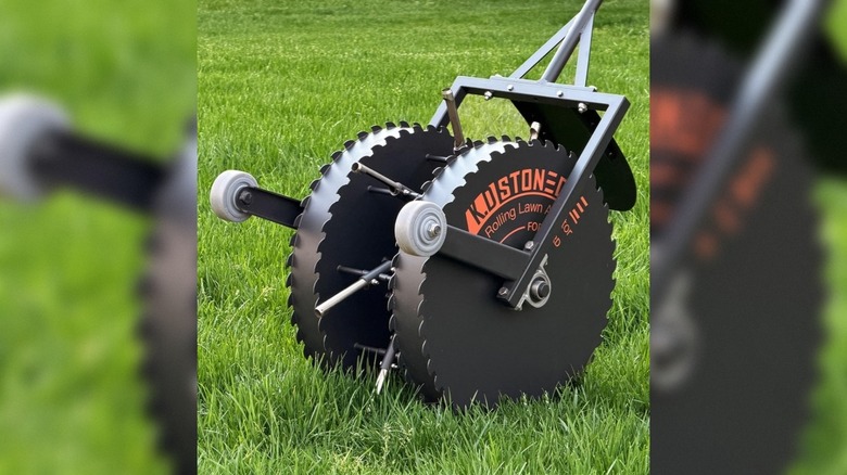 the K.D STONEDGE rolling lawn aerator on grass