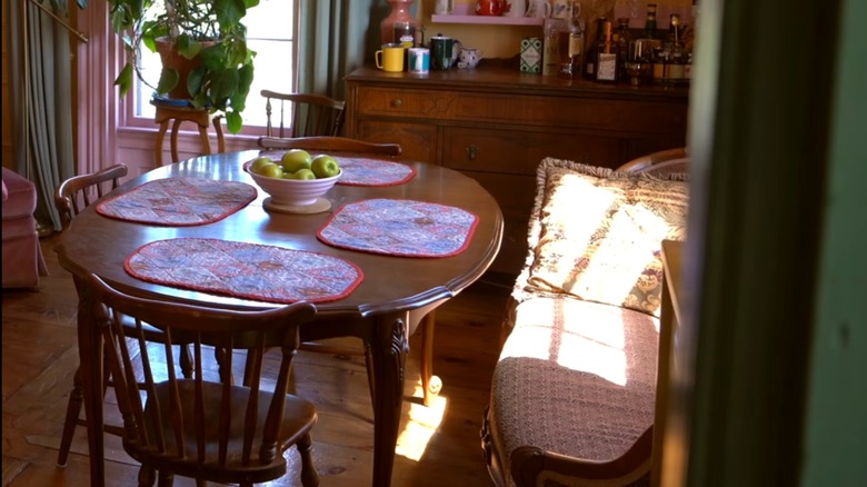 vintage inspired dining room with couch