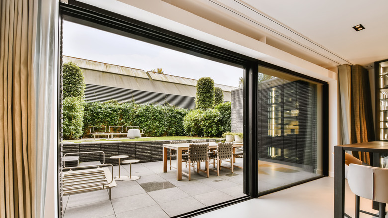 Wide view of a sliding glass door and patio