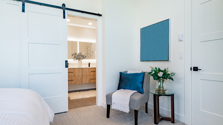 Bedroom with barn door to ensuite.