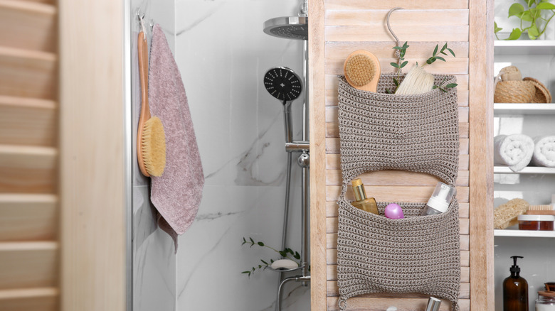 Bathroom door with hanging storage caddy