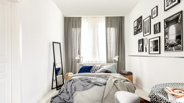 Small bedroom with gallery wall