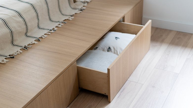 Bed with storage underneath