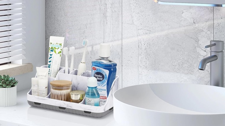 A GFWARE organizer on a bathroom countertop