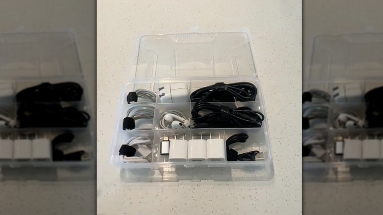 Clear plastic compartment cased used to store tech accessories.