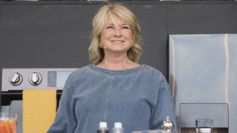 Martha Stewart standing in kitchen