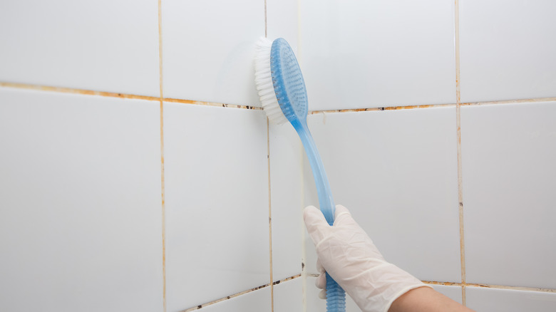 White tiles with dirty grout lines