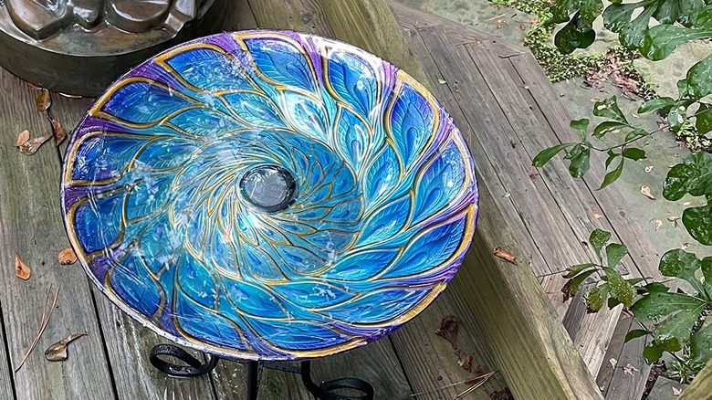 MUMTOP's Solar Glass Bird Bath on a wooden deck