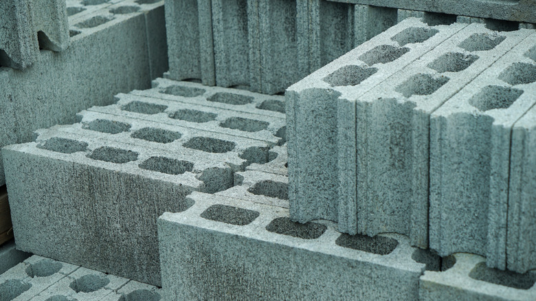 Several hollow cement blocks stacked up together