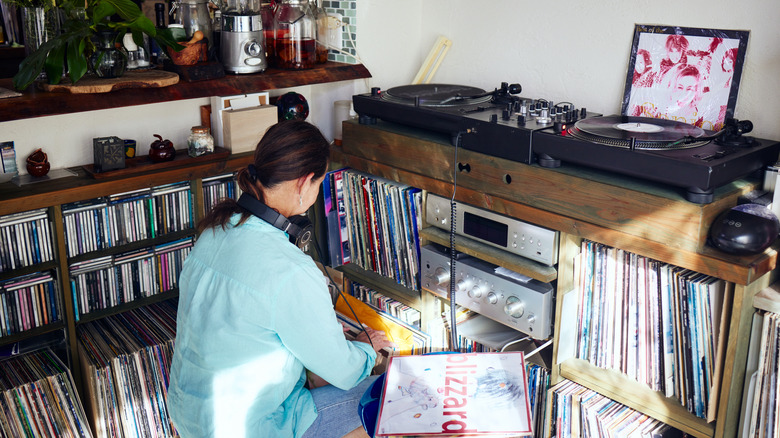 Person looking through vinyl collection