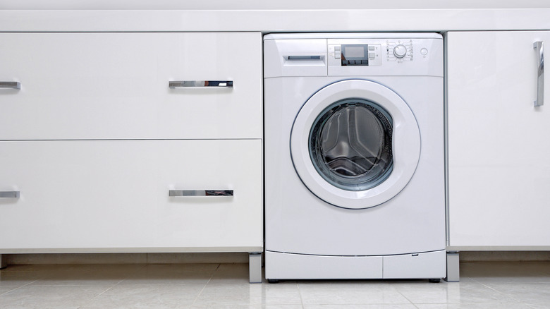 Washing machine in bathroom cabinets
