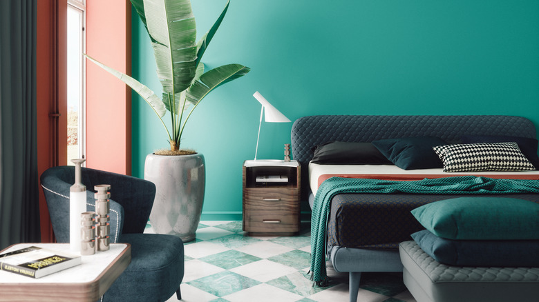 A color-maxxed room using teal, white, and orange