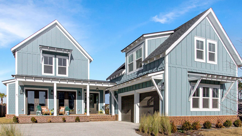 blue home with garage